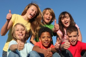 diverse grop of kids, children or tweens thumbs up
